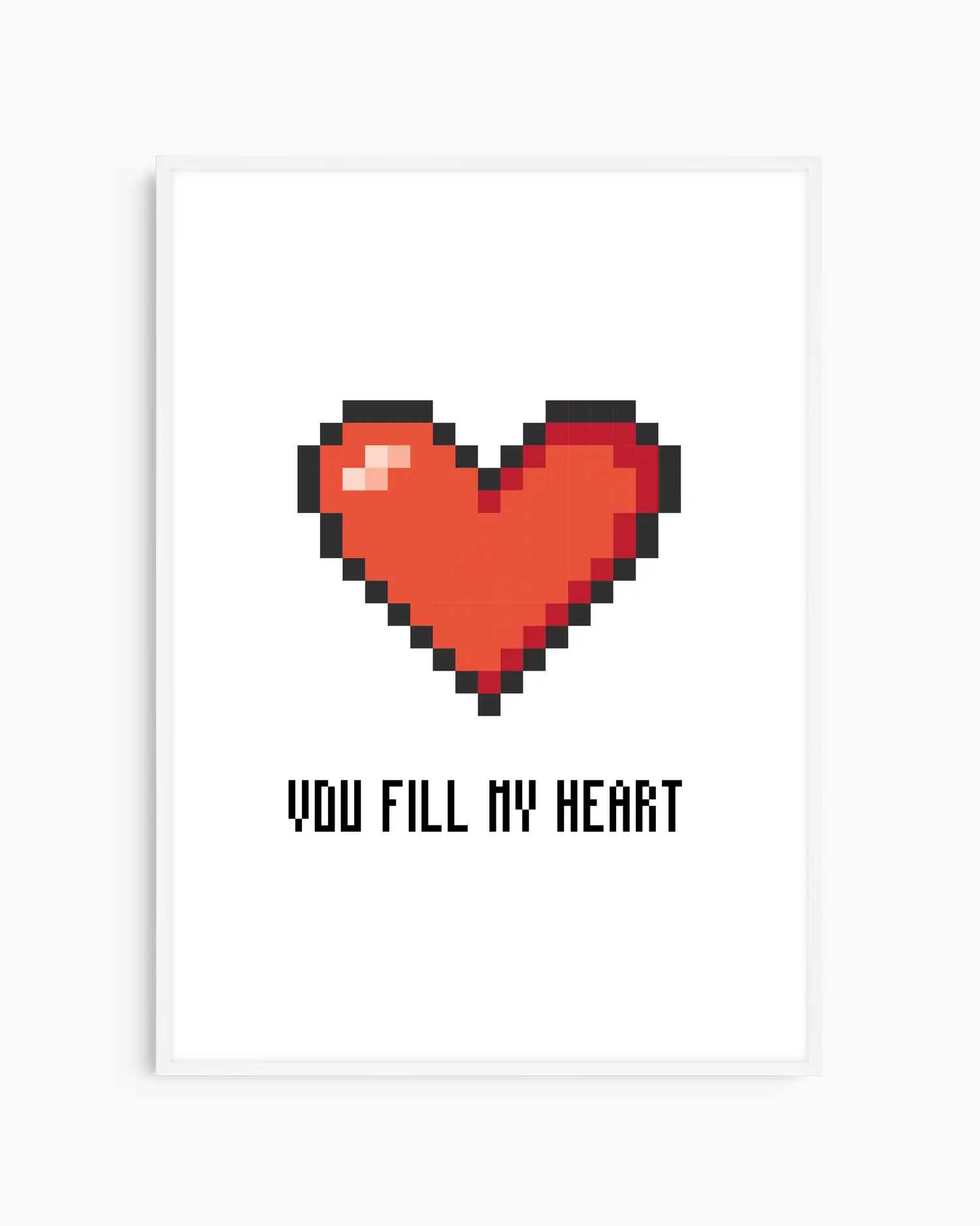 Nursery poster with a red pixel heart and the text 'You Fill My Heart' text on a white background, framed in a white wooden frame.
