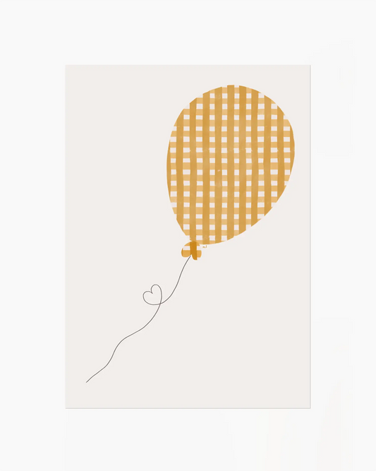 Yellow checkered balloon on a white background