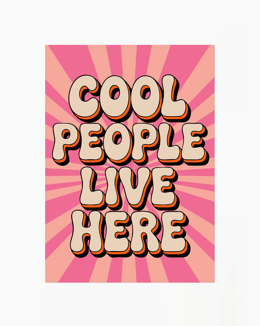 Nursery poster with 'Cool People Live Here' text on a pink sunburst background.