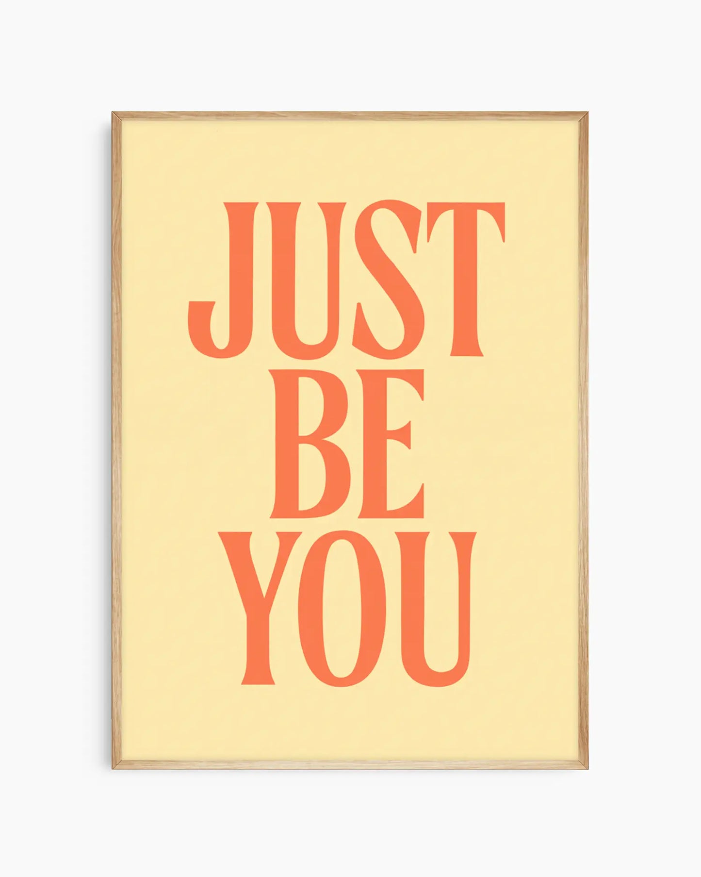 Framed poster with 'JUST BE YOU' text on a light yellow background