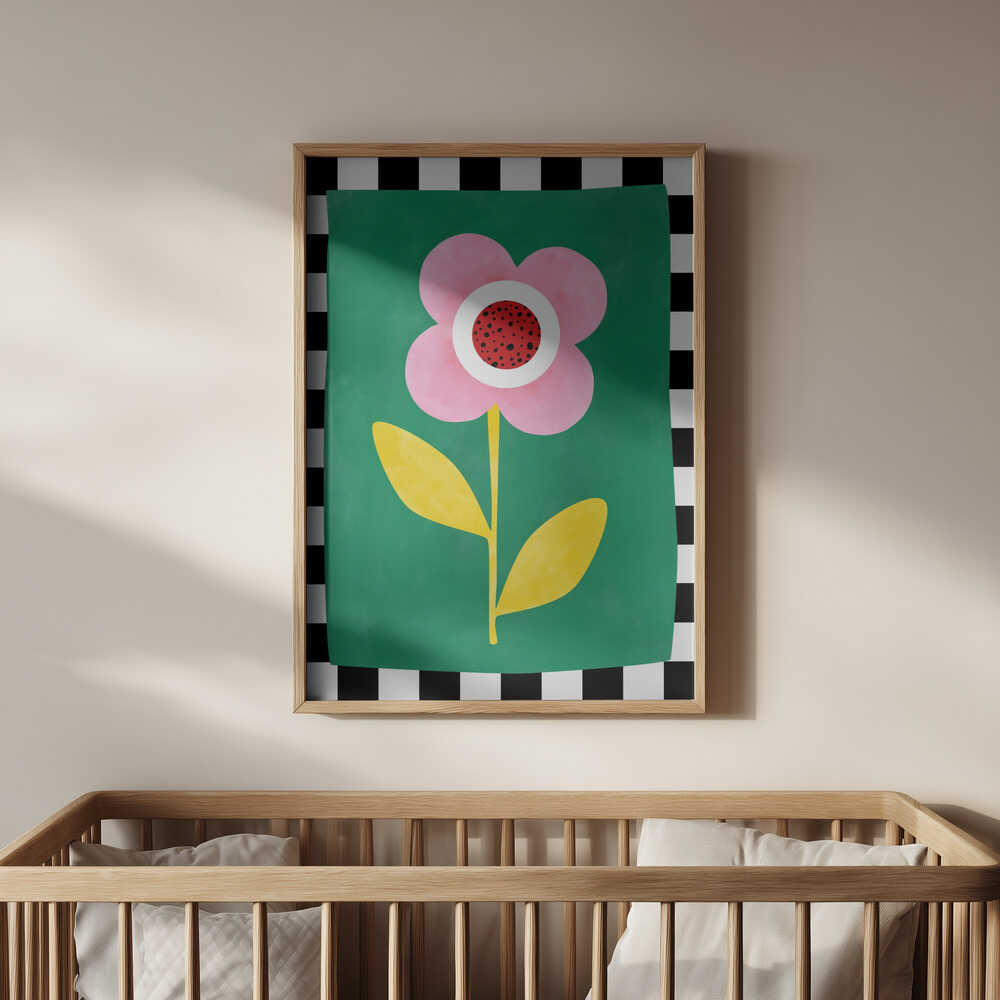 Poster of a big pink, red, white  and yellow flower on a green background and white and black stripes surrounding it like a frame hanging above the baby's crib