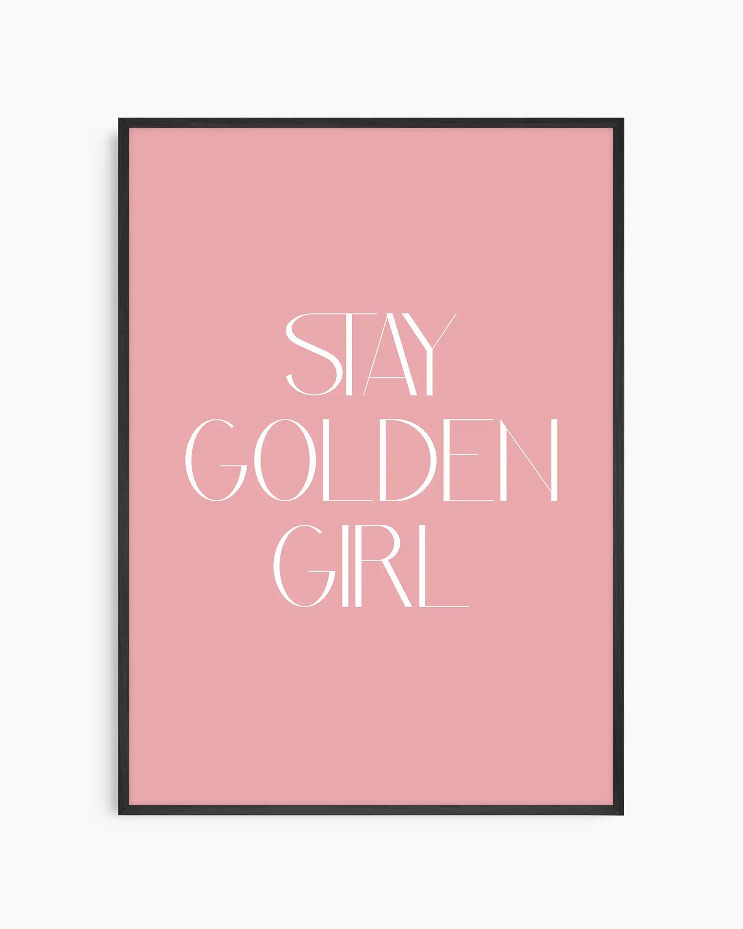Nursery poster with 'Stay Golden Girl' text on a pink background framed in a black frame