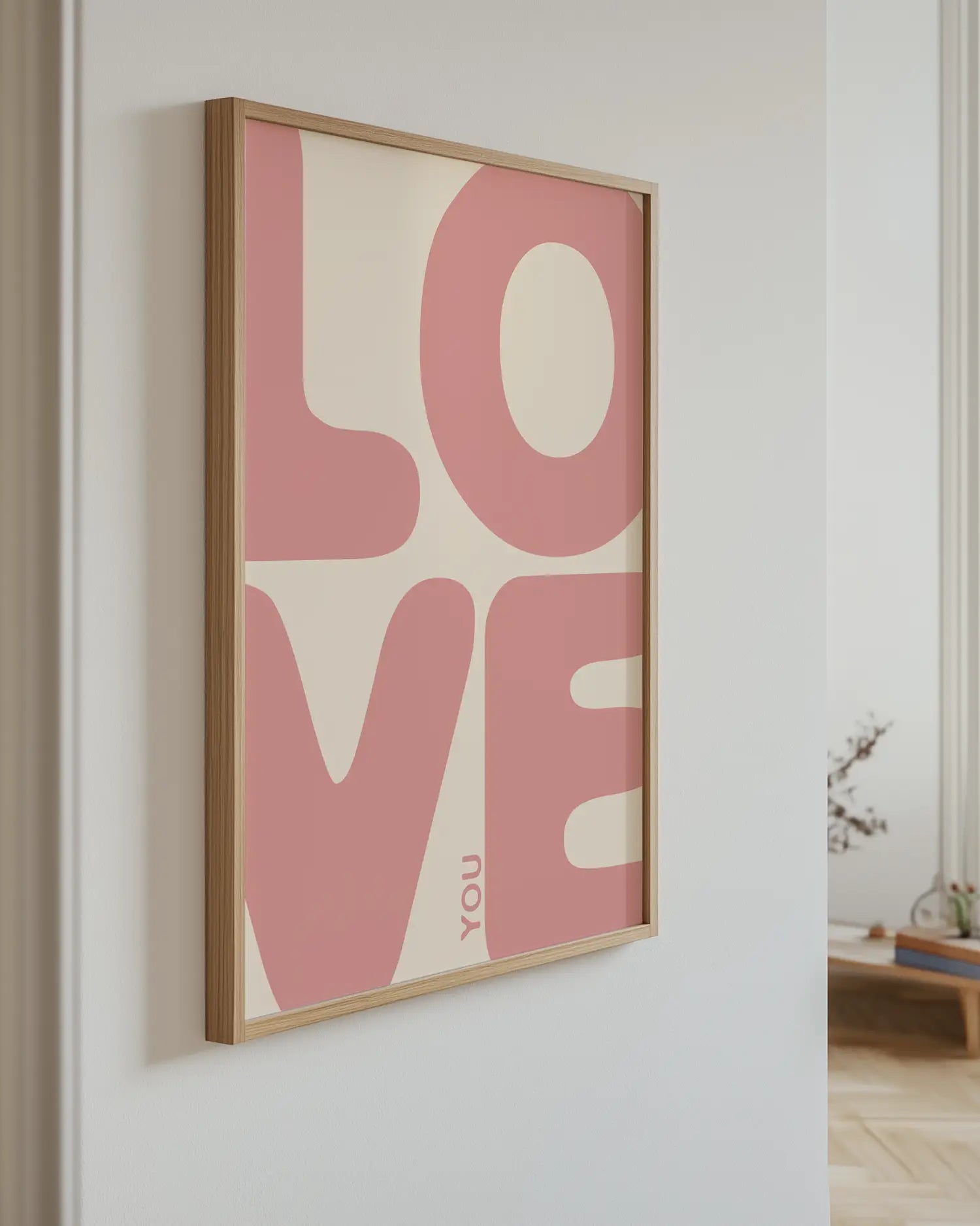 Artwork with 'LOVE YOU' text on a wall