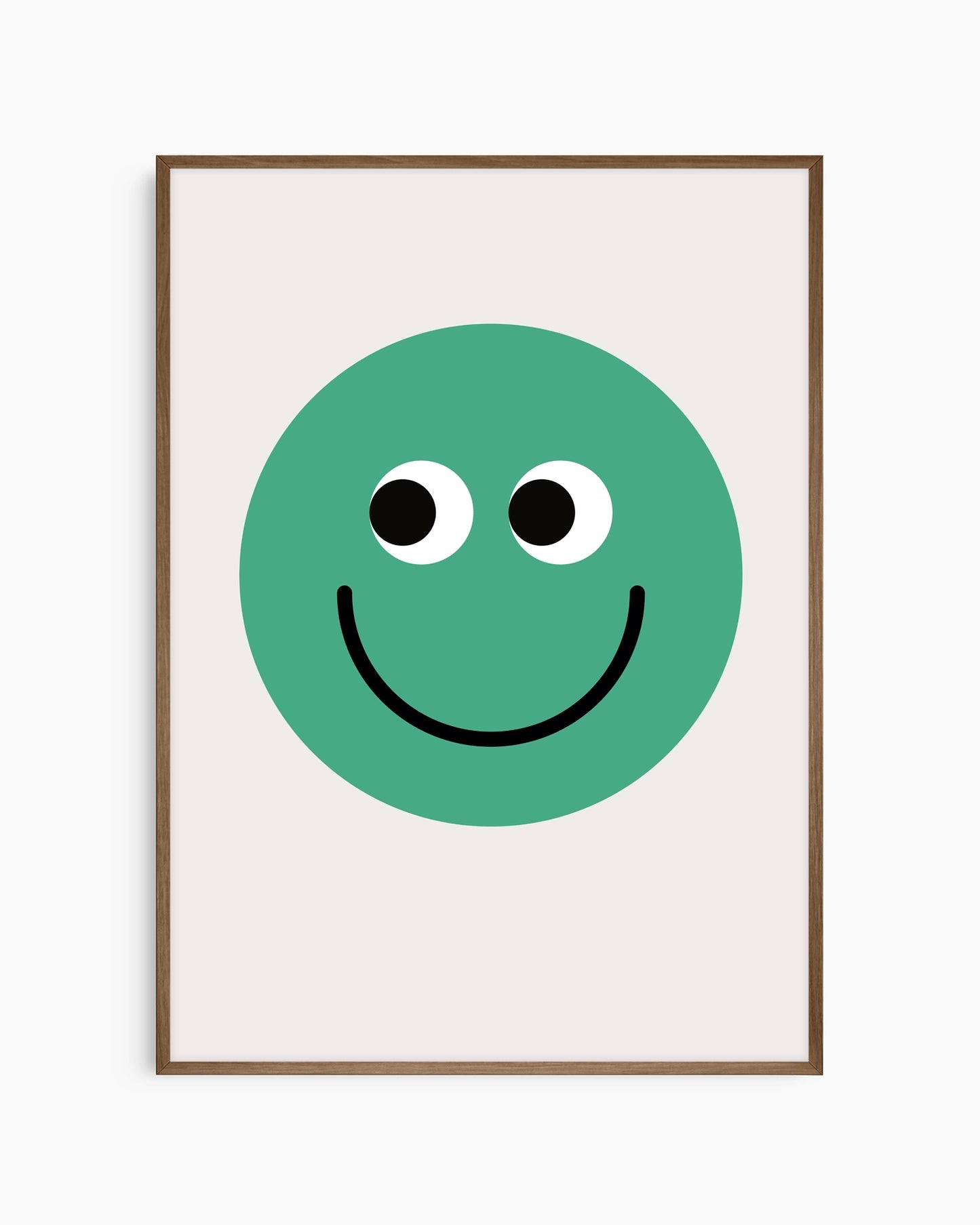 Framed poster with a green smiley face on a white background