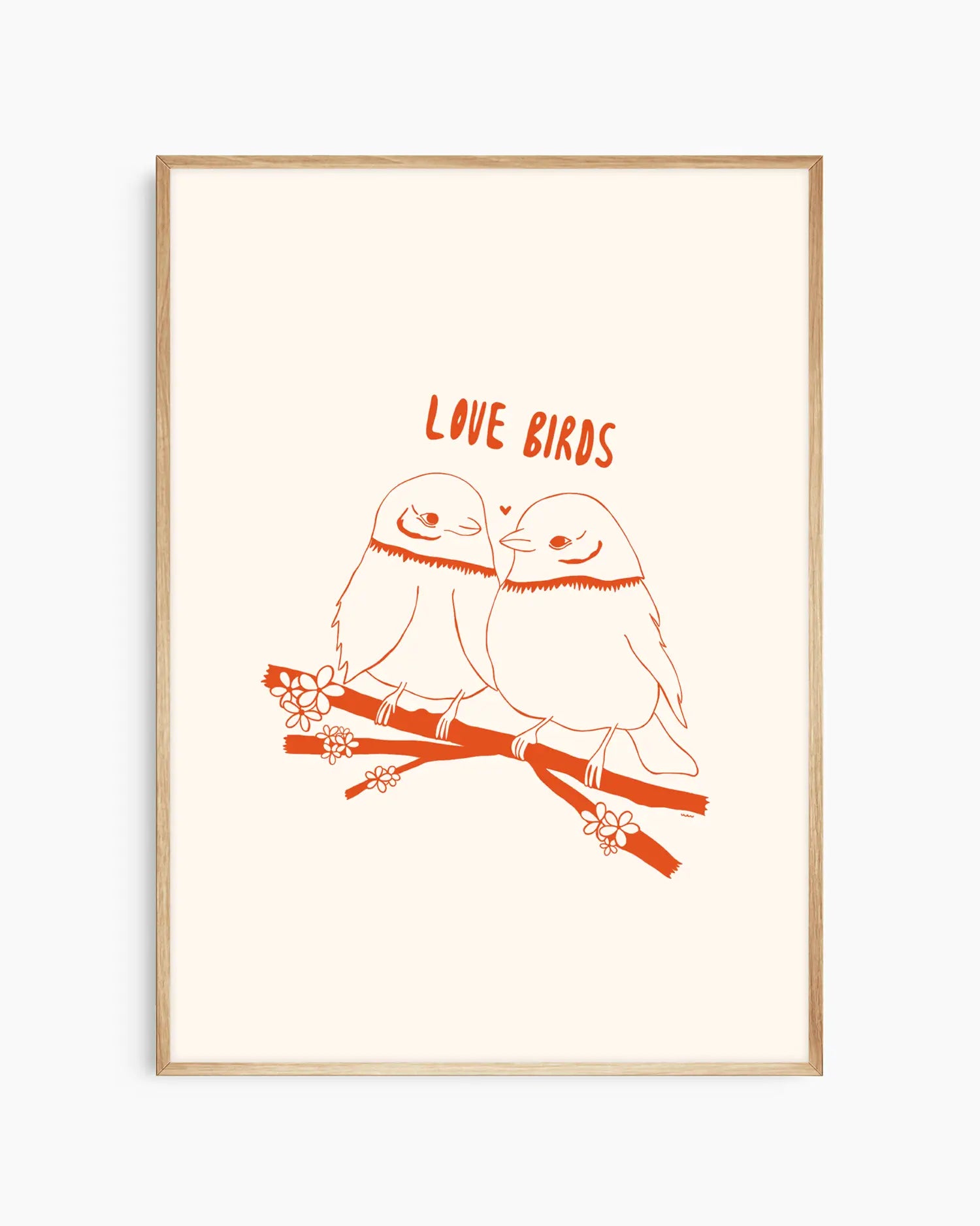 Framed artwork with two birds on a branch and 'Love Birds' text.