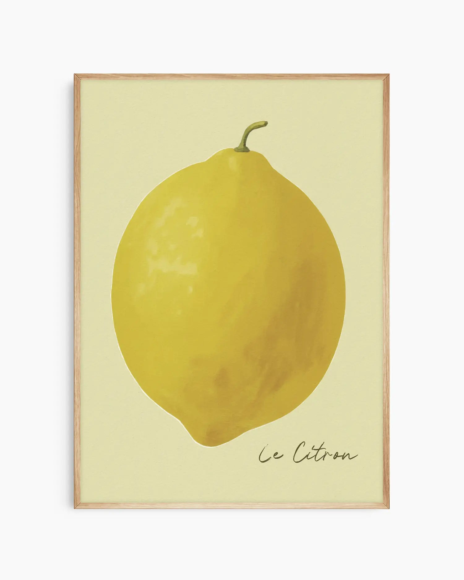 Framed artwork of a lemon with 'Le Citron' text on a light background in an oak wooden frame.