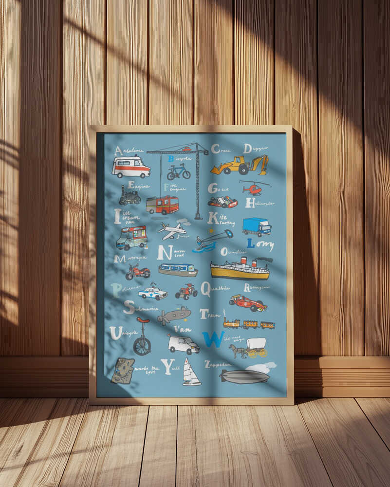 Educational kids’ poster featuring illustrated vehicles and transport types from A to Z on a blue background. Displayed in a light wooden frame leaning against a wooden wall with warm sunlight and shadows. Perfect alphabet wall art for children’s rooms and play areas.