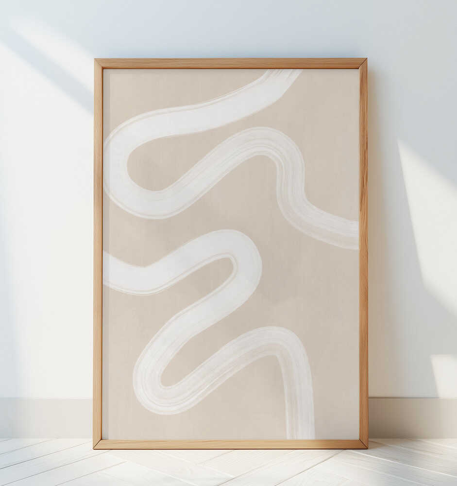 Neutral abstract poster with flowing white brushstrokes on a beige backdrop, framed in light wood and leaning against a white wall. A simple and timeless art print that brings softness and balance to any minimalist home decor.