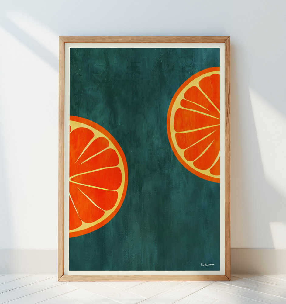Colorful citrus poster with orange slices on a teal blue background, framed in light wood and leaning against a white wall. A playful and modern art print that adds a fresh, summery vibe to kitchen or dining room decor.